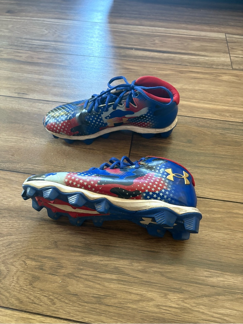 Under Armour Kids' Blue and Red Star-Print Football Cleats
